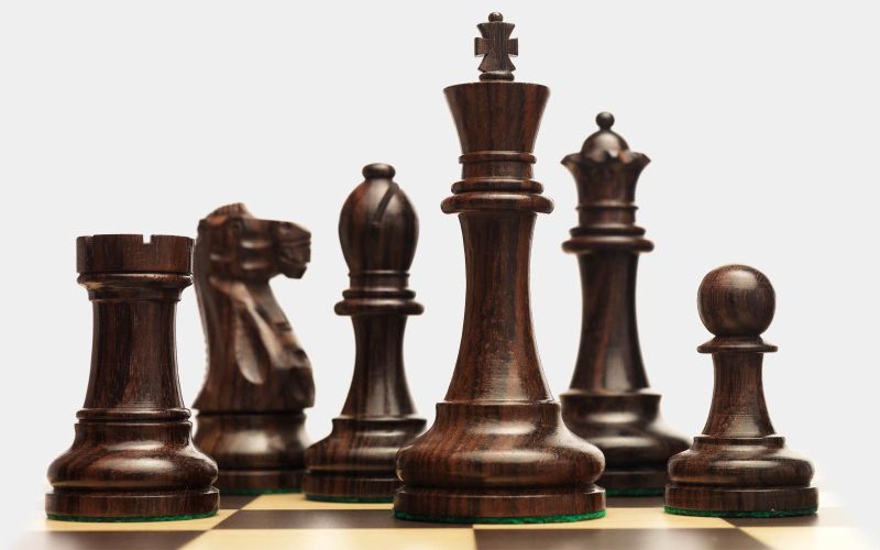 Several chess pieces on a board